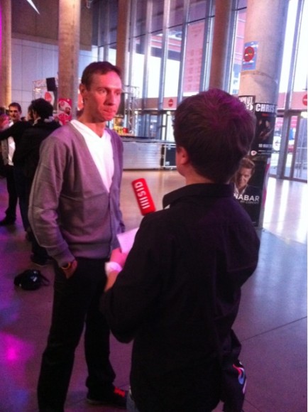 Jens Voigt in grey cardigan being interviewed